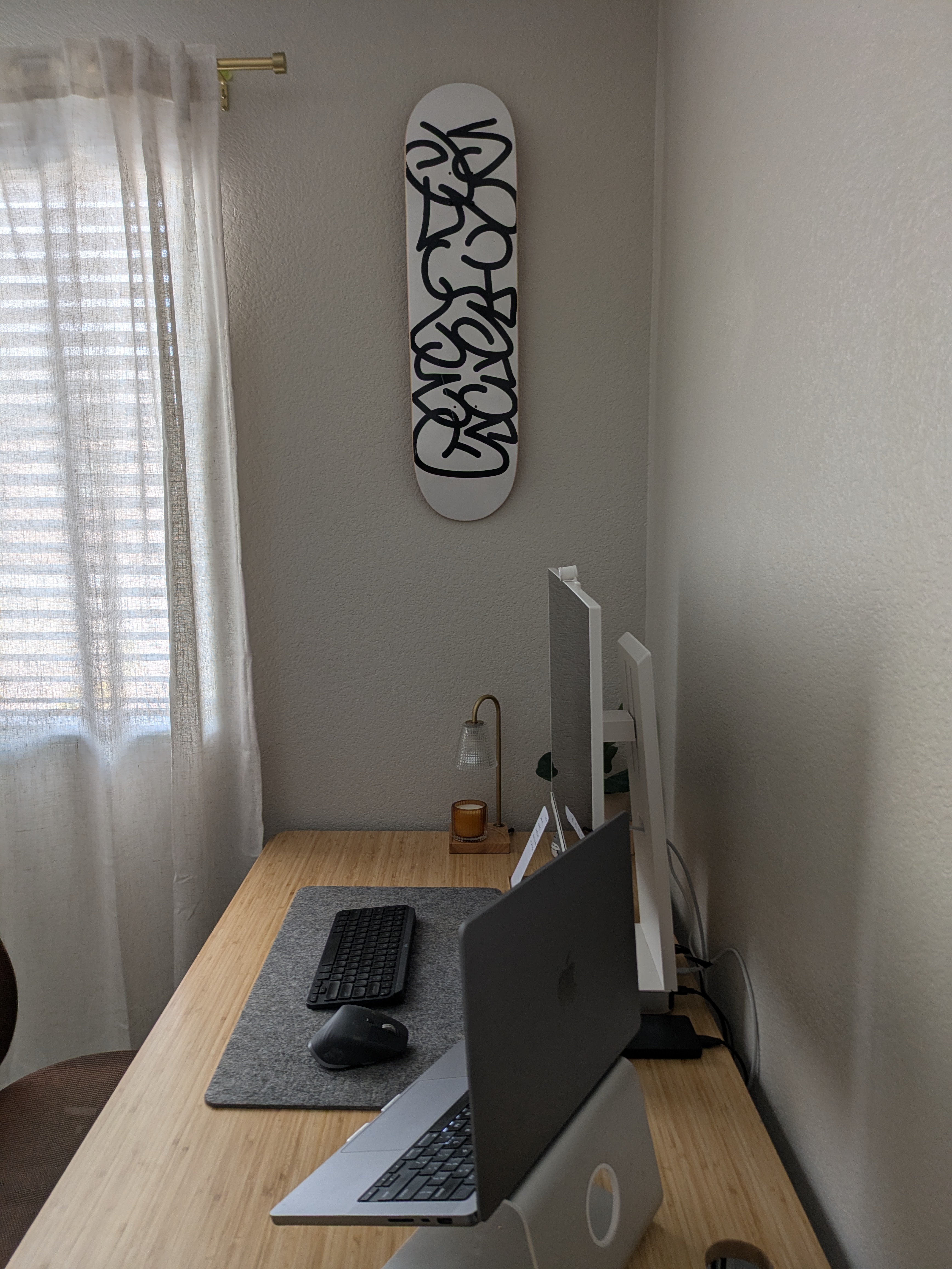Home office setup with skateboard
