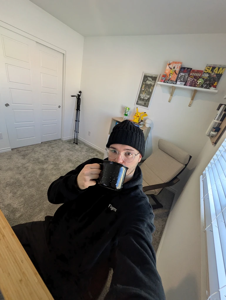 Jacob with coffee in home office
